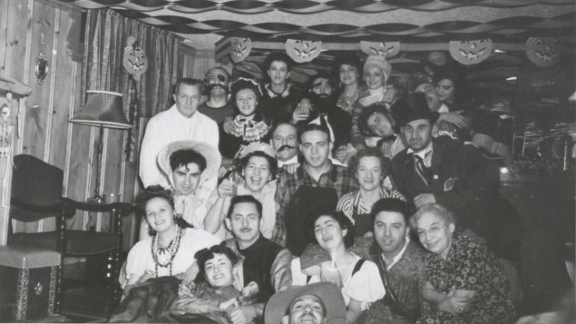 Harry Levene is front row wearing a top hat. In the centre, the man with the fake beard, is actor Lou Jacobi. He was a hired actor for that event. The Toronto born actor would find fame on the Broadway stage on in many Hollywood studio films. Anne Levene stands to his right.